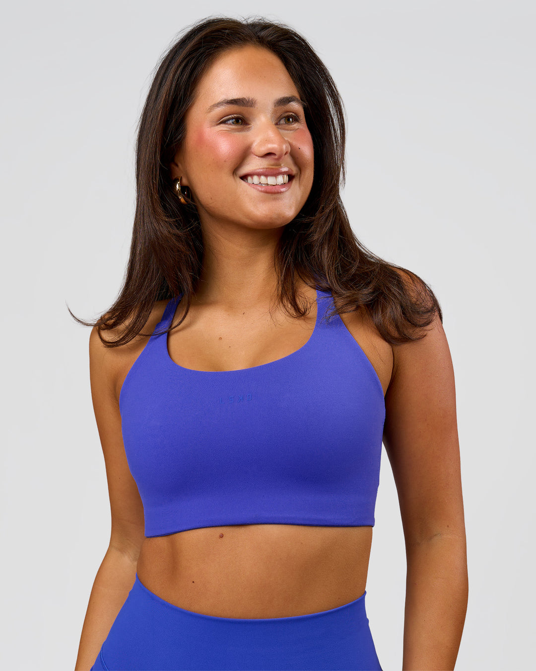 Woman wearing Twist Sports Bra D/DD/E - Power Cobalt | Model:Bianca | Size:S - view 4