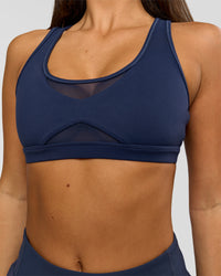Woman wearing Unstoppable Racerback Sports Bra - Future Navy | Model:Bianca | Size:S | Thumbnail Index: 10