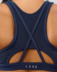 Woman wearing Unstoppable Racerback Sports Bra - Future Navy | Model:Bianca | Size:S | Thumbnail Index: 6