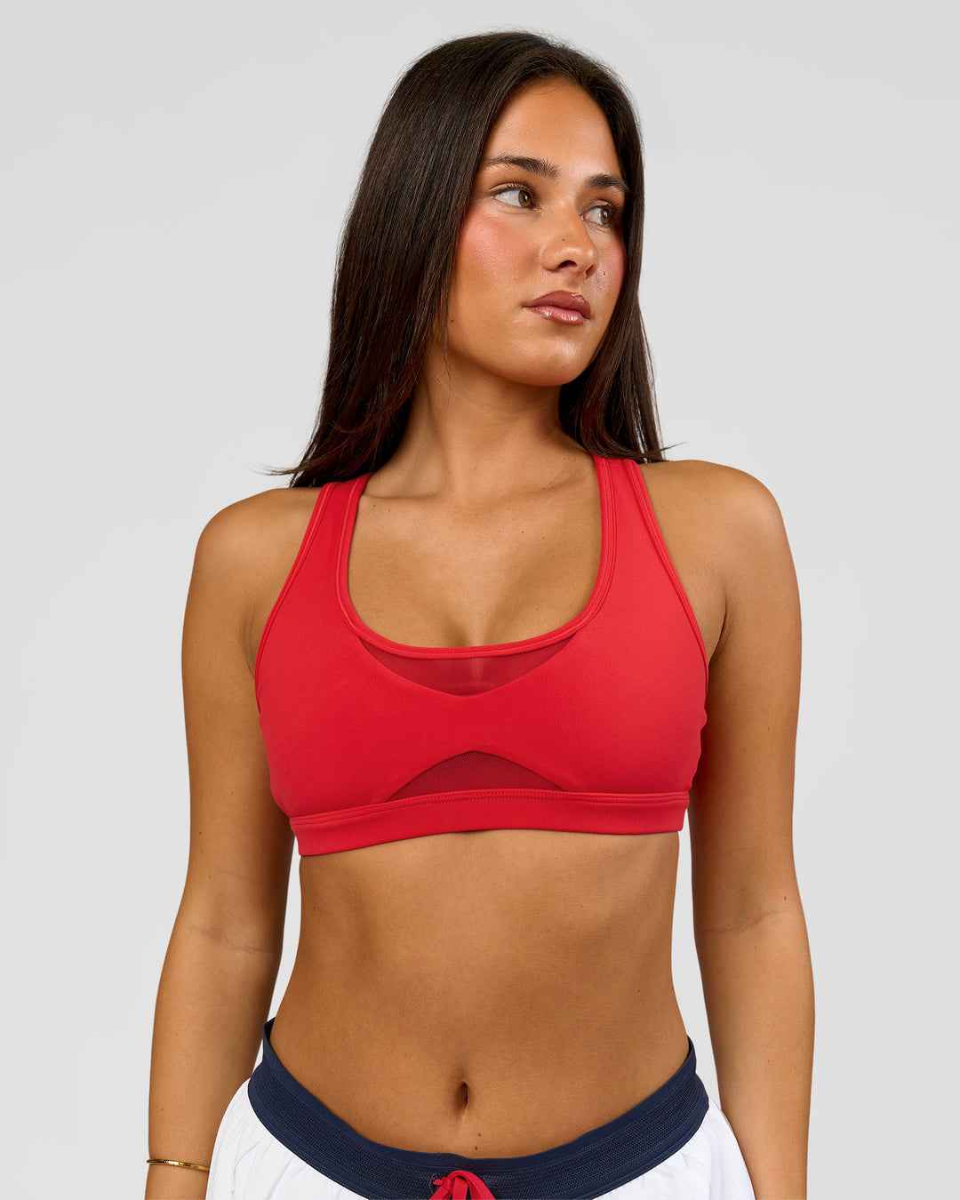 Woman wearing Unstoppable Racerback Sports Bra - Scarlet | Model:Bianca | Size:S - view 12