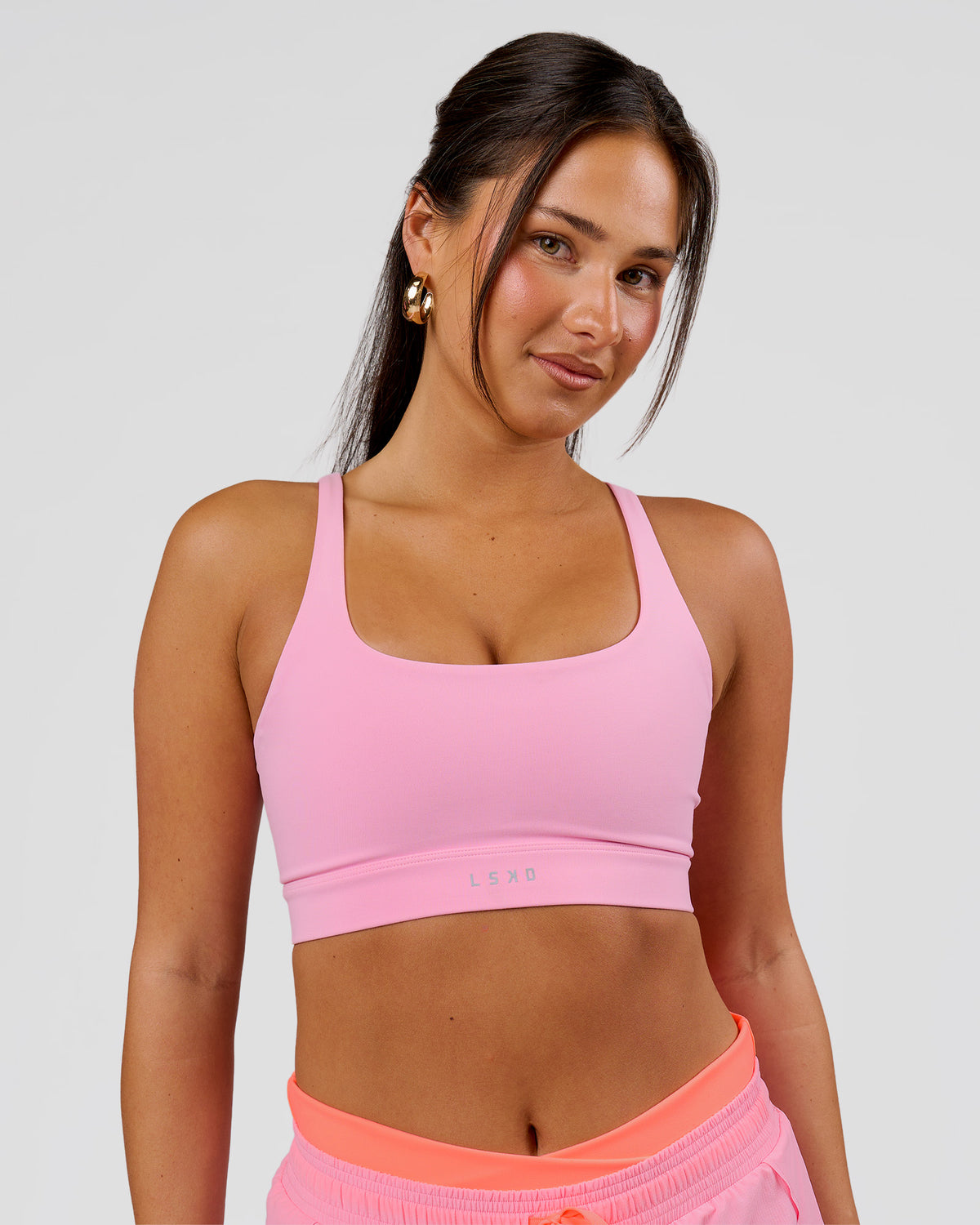 Woman wearing Vision Sports Bra - Pink Rose | Model:Bianca | Size:S - view 1