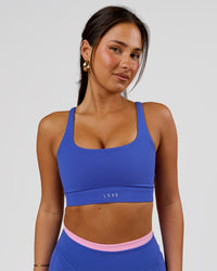 Woman wearing Vision Sports Bra - Power Cobalt | Model:Bianca | Size:S | Thumbnail Index: 1