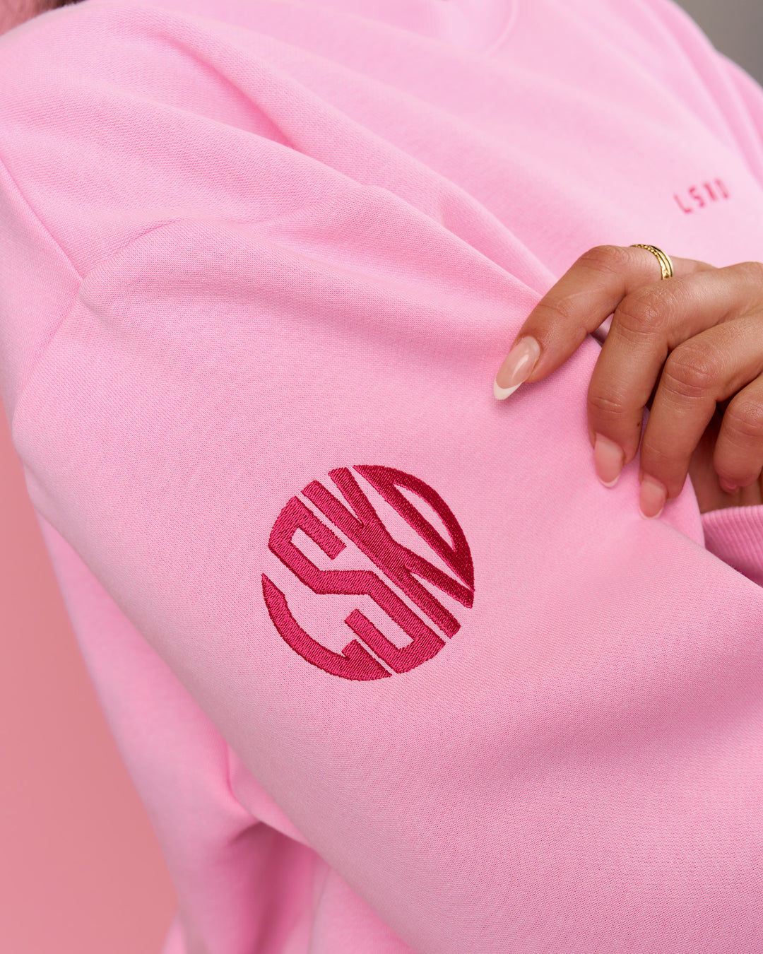 Woman wearing We Rise Oversized Sweater - Pink Rose-We Rise | Model:Bianca | Size:S - view 4