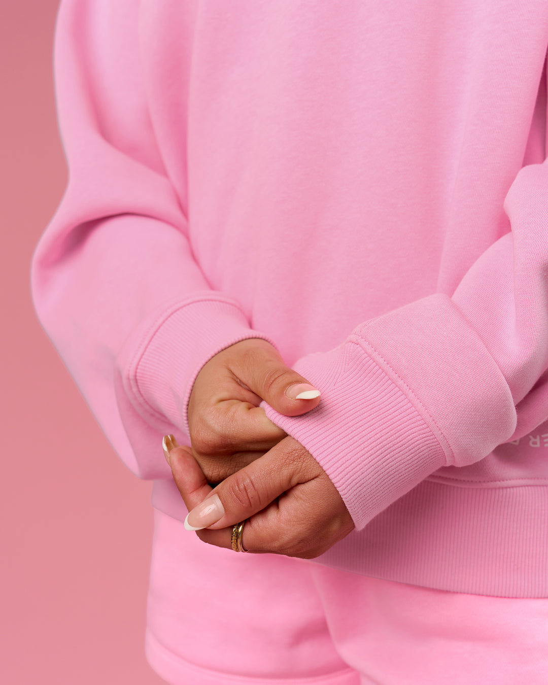 Woman wearing We Rise Oversized Sweater - Pink Rose-We Rise | Model:Bianca | Size:S - view 12