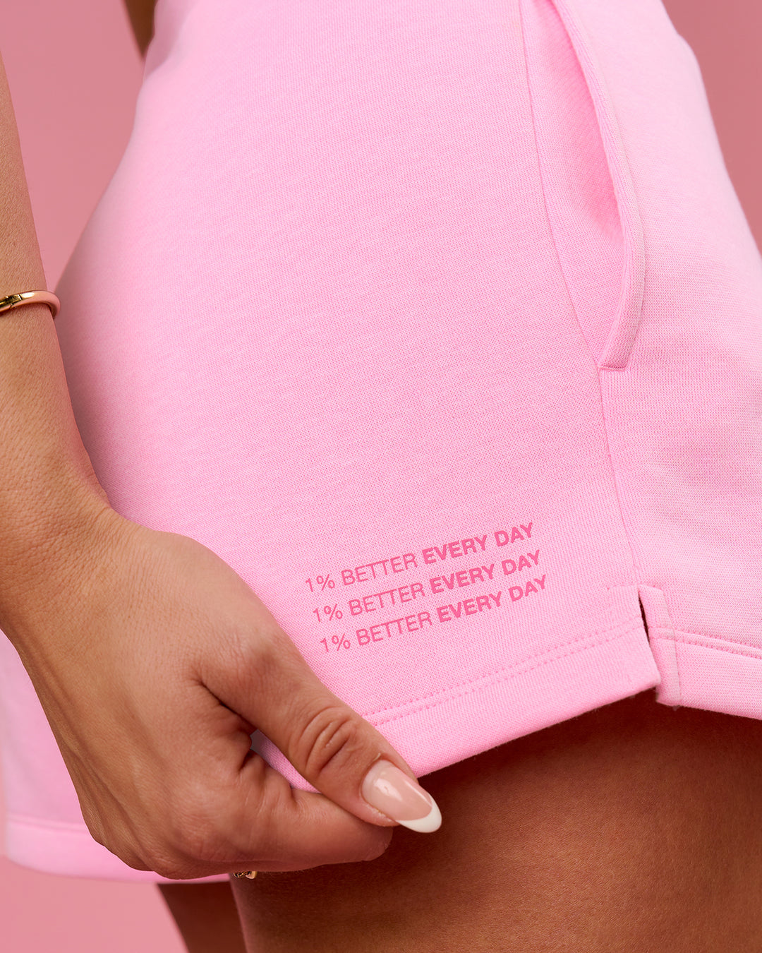 Woman wearing We Rise Shorts  - Pink Rose-We Rise | Model:Bianca | Size:S - view 12