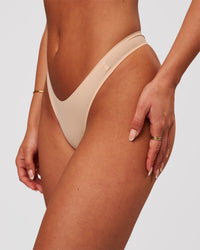 Woman wearing Zero Thong 2pk - Frappe | Model:Bianca | Size:S | Thumbnail Index: 1