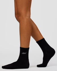 Woman wearing Script Quarter Socks 3 Pack 2.0 - Black-Grey-White | Model:Charli | Size:S