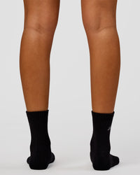 Woman wearing Script Quarter Socks 3 Pack 2.0 - Black-Grey-White | Model:Charli | Size:S