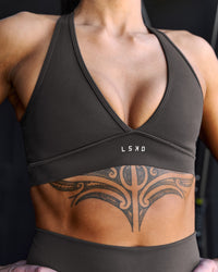 Woman wearing Stamina Sports Bra - Onyx | Model:Chelsea | Size:S | Thumbnail Index: 5