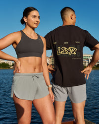 Woman wearing Accelerate Sports Bra - Onyx | Model:Emily | Size:S | Thumbnail Index: 1