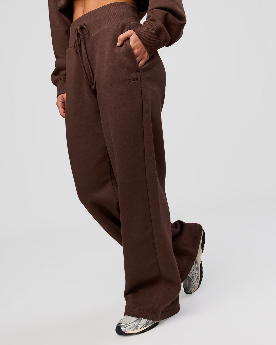 Woman wearing Go-To Wide Leg Track Pant - Hot Chocolate | Model:Issy | Size:S