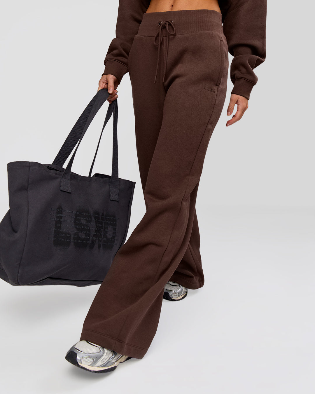 Woman wearing Go-To Wide Leg Track Pant - Hot Chocolate | Model:Issy | Size:S