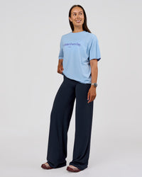 Woman wearing VS6 1% Better Fathers Day FLXCotton Oversized Tee - Open Air | Model:Jess | Size:S | Thumbnail Index: 5