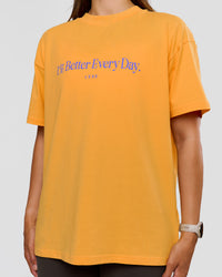 Woman wearing VS6 1% Better Fathers Day FLXCotton Oversized Tee - Warm Apricot | Model:Jess | Size:S | Thumbnail Index: 8