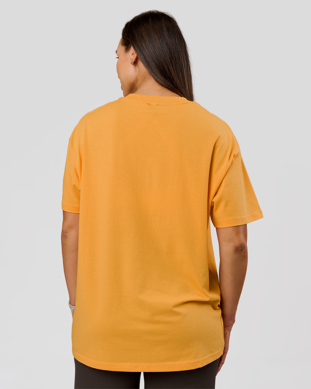 Woman wearing VS6 1% Better Fathers Day FLXCotton Oversized Tee - Warm Apricot | Model:Jess | Size:S - view 12