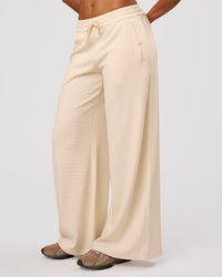 Woman wearing CloudWaffle Wide Leg Pants - Vanilla Bean | Model:Jordan | Size:S | Thumbnail Index: 0