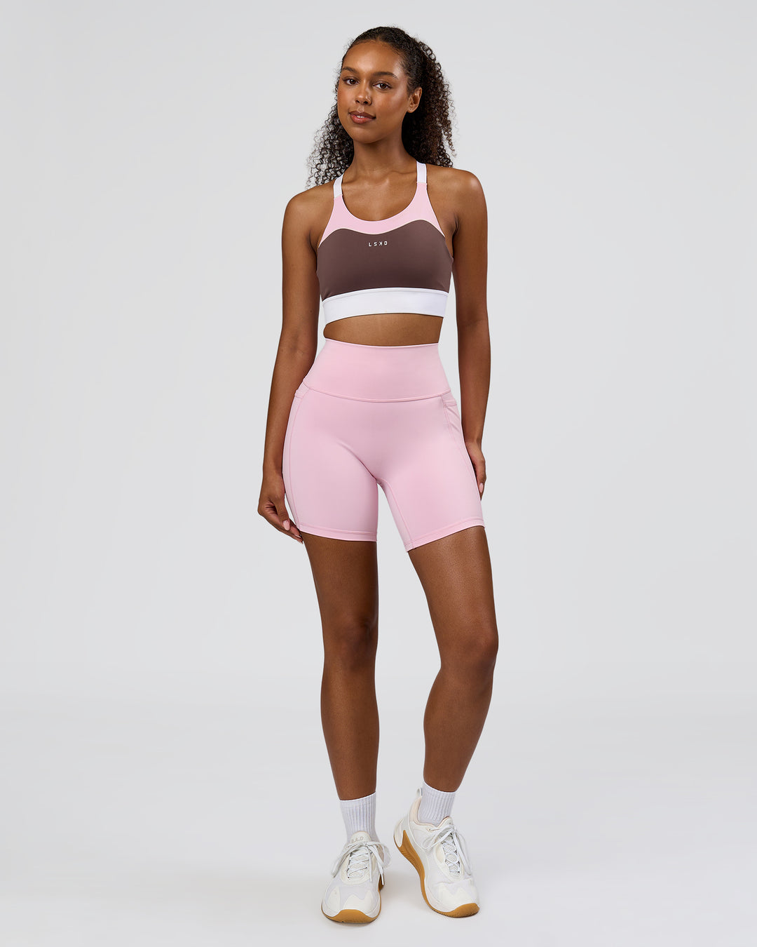 Woman wearing Elevated Accelerate Sports Bra - Cocoa Powder-Marshmallow-White | Model:Jordan | Size:S - view 6