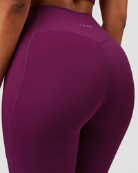 Woman wearing Elixir High-Rise Full Length Legging Pockets - Plum Caspia | Model:Jordan | Size:S | Thumbnail Index: 5