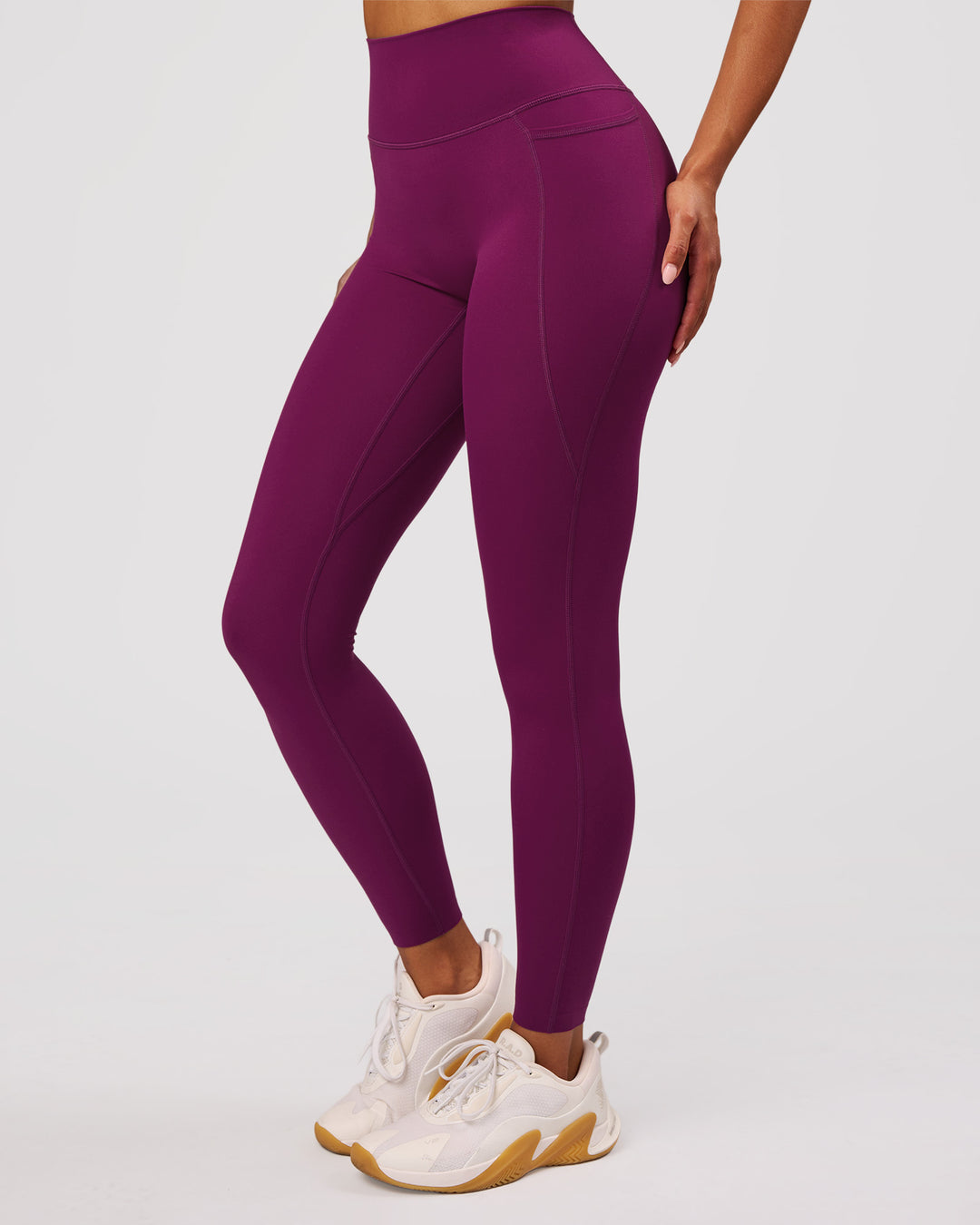 Woman wearing Elixir High-Rise Full Length Legging Pockets - Plum Caspia | Model:Jordan | Size:S - view 4