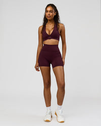Woman wearing Fusion Ultra High-Rise 4" Short Pockets - Cherry Lacquer | Model:Jordan | Size:S | Thumbnail Index: 1