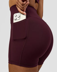 Woman wearing Fusion Ultra High-Rise 4" Short Pockets - Cherry Lacquer | Model:Jordan | Size:S | Thumbnail Index: 3