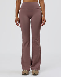 Woman wearing Fusion V-Contour Bind High-Rise Flared Legging - Cocoa Power-White | Model:Jordan | Size:S | Thumbnail Index: 1