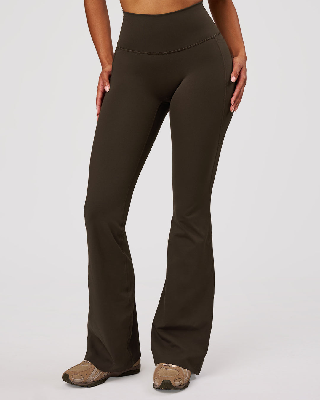 Woman wearing Fusion V-Contour High-Rise Flared Legging Pockets - Ground Coffee | Model:Jordan | Size:S - view 9