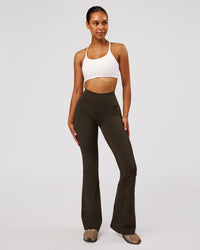 Woman wearing Fusion V-Contour High-Rise Flared Legging Pockets - Ground Coffee | Model:Jordan | Size:S | Thumbnail Index: 3