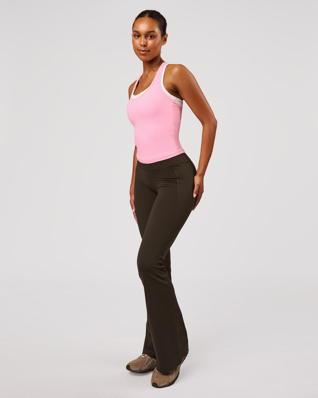 Woman wearing Fusion V-Contour High-Rise Flared Legging Pockets - Ground Coffee | Model:Jordan | Size:S - view 10