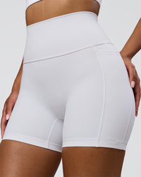 Woman wearing Fusion V-Contour Ultra High-Rise 4" Short Pockets - White | Model:Jordan | Size:S | Thumbnail Index: 2