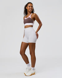 Woman wearing Fusion V-Contour Ultra High-Rise 4" Short Pockets - White | Model:Jordan | Size:S | Thumbnail Index: 6