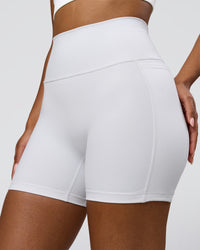 Woman wearing Fusion V-Contour Ultra High-Rise 6" Short Pockets - White | Model:Jordan | Size:S | Thumbnail Index: 2