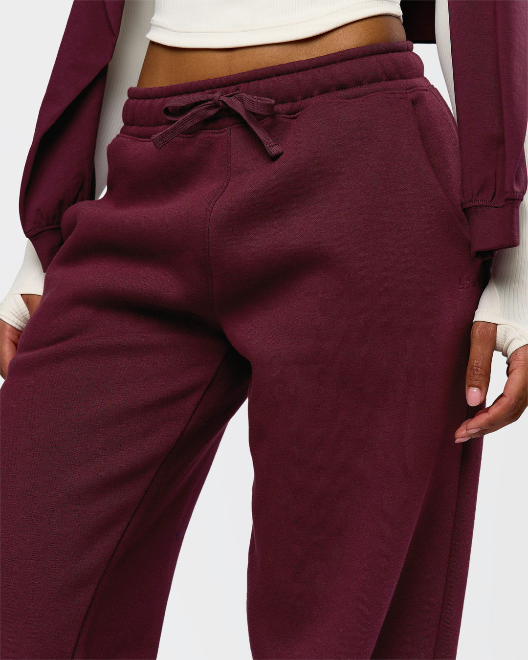 Woman wearing Go-To Oversized Track Pant - Cherry Lacquer | Model:Jordan | Size:S - view 3