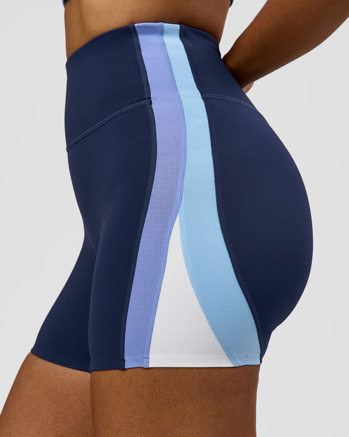 Woman wearing Revitalise Ultra High-Rise 4" Short - Future Navy - Bluebell | Model:Jordan | Size:S