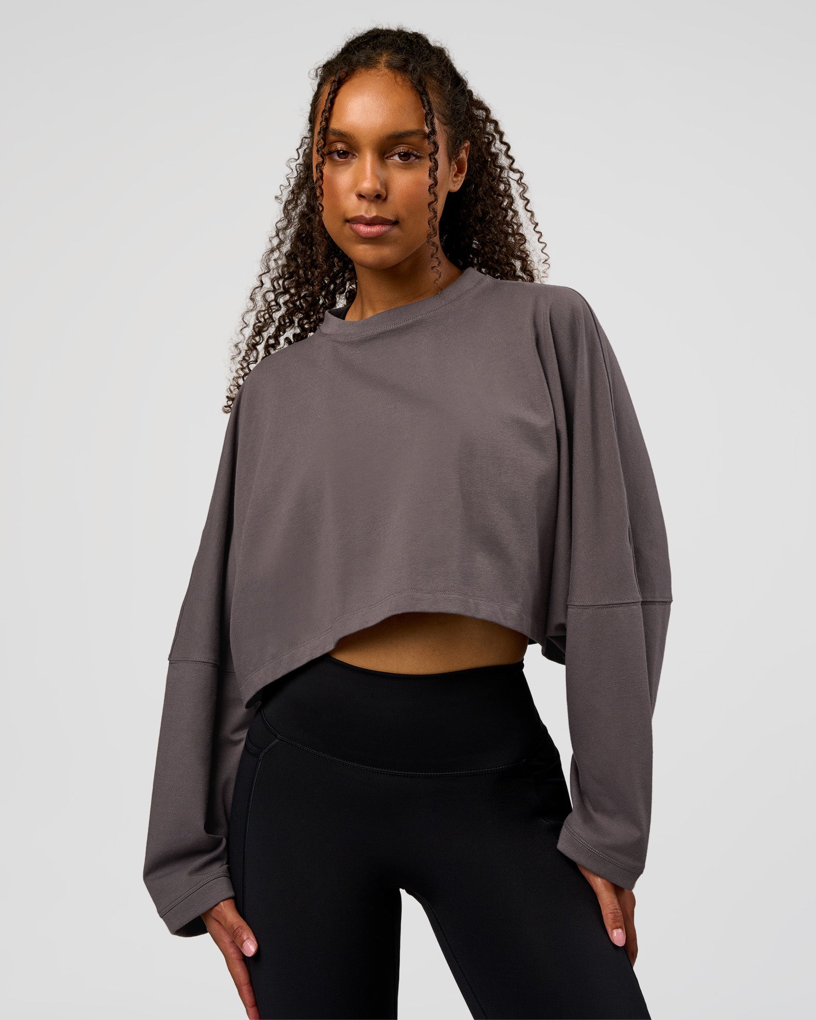 Woman wearing Street Surge Long Sleeve Tee - Duskstone | Model:Jordan | Size:S