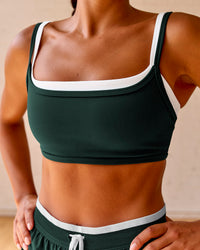 Woman wearing Balance Sports Bra - Midnight Green-White | Model:Meg | Size:S | Thumbnail Index: 0