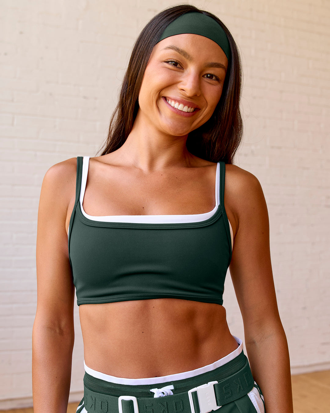 Woman wearing Balance Sports Bra - Midnight Green-White | Model:Meg | Size:S - view 7