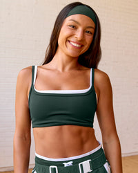 Woman wearing Balance Sports Bra - Midnight Green-White | Model:Meg | Size:S | Thumbnail Index: 6