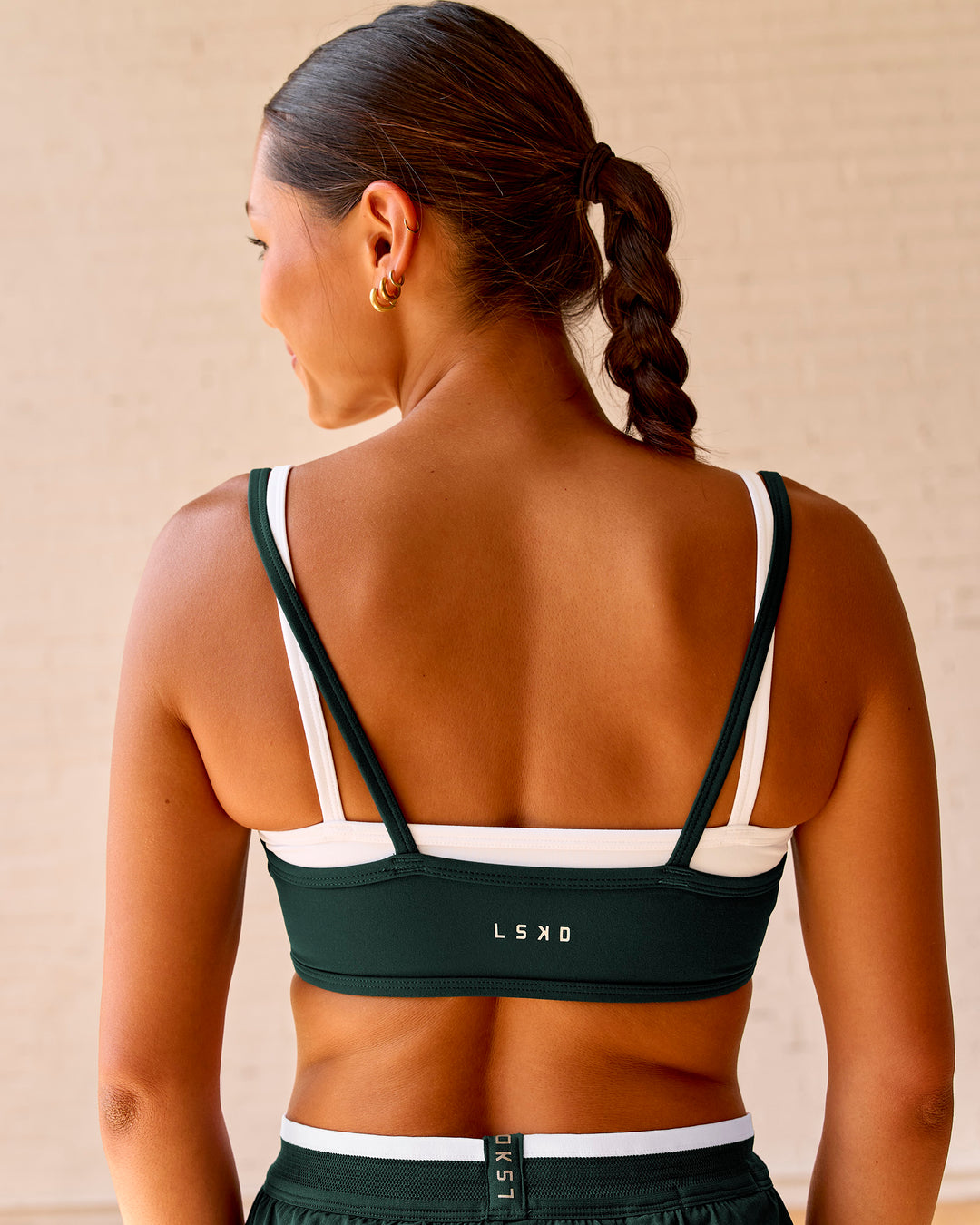 Woman wearing Balance Sports Bra - Midnight Green-White | Model:Meg | Size:S - view 9