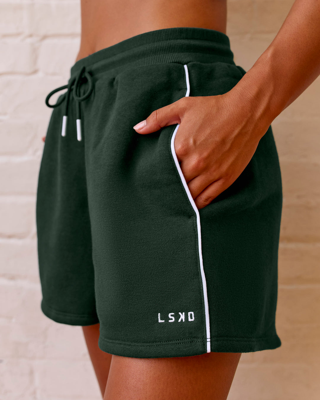 Woman wearing Fast Track Lounge Short - Midnight Green-White | Model:Meg | Size:S - view 12