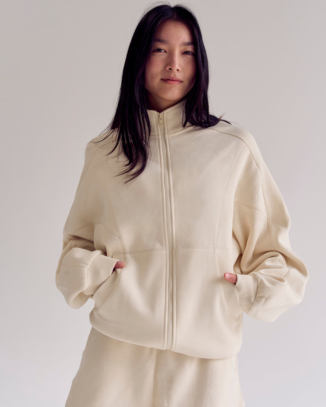 Woman wearing Bree Oversized Fleece Zip Thru - Vanilla Bean | Model:Rianna | Size:S - view 19