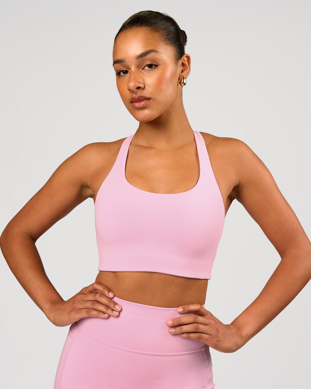 Woman wearing Flow Long Line Sports Bra - Pink Rose | Model:Rosie | Size:S - view 2