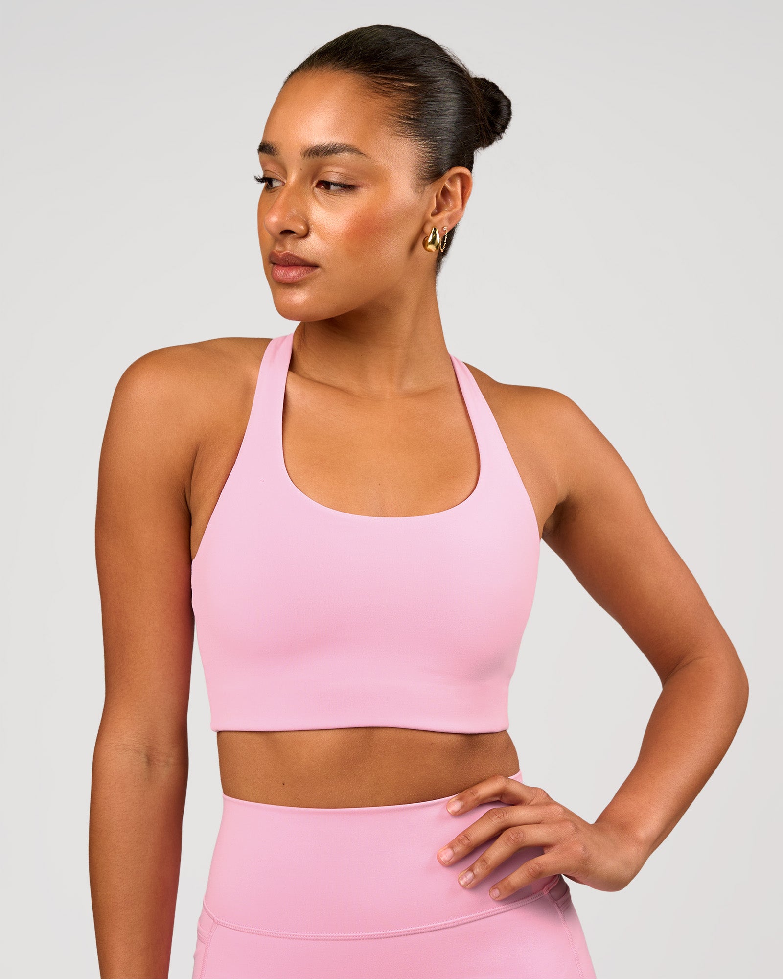Woman wearing Flow Long Line Sports Bra - Pink Rose | Model:Rosie | Size:S