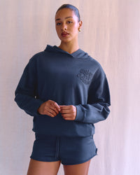 Woman wearing MVP Elite French Terry Hoodie - Future Navy | Model:Rosie | Size:S | Thumbnail Index: 1