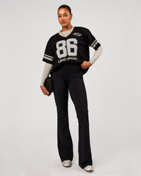 Woman wearing Playmaker V-Neck Jersey - Black-Shale Beige | Model:Rosie | Size:S | Thumbnail Index: 3