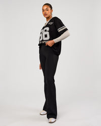 Woman wearing Playmaker V-Neck Jersey - Black-Shale Beige | Model:Rosie | Size:S | Thumbnail Index: 4