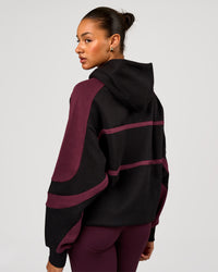 Woman wearing Vibe Oversized Hoodie - Black-Cherry Lacquer | Model:Rosie | Size:S | Thumbnail Index: 8