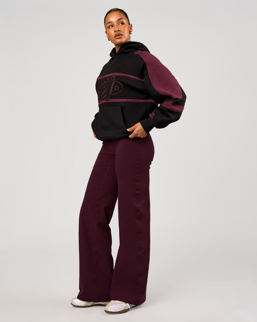 Woman wearing Vibe Oversized Hoodie - Black-Cherry Lacquer | Model:Rosie | Size:S - view 11