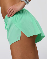 Woman wearing Accelerate 3" Mid-Rise Running Short - Jelly Mint | Model:Summer | Size:S | Thumbnail Index: 6