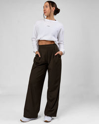 Woman wearing StretchShift Wide Leg Pant - Ground Coffee | Model:Summer | Size:S | Thumbnail Index: 0